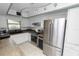 Updated kitchen featuring stainless steel appliances and bright lighting at 2025 Sylvester Rd # E2, Lakeland, FL 33803