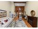 Bright living room featuring hardwood floors, a vaulted ceiling, and stylish decor at 2025 Sylvester Rd # E2, Lakeland, FL 33803