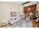 Comfortable living room with a plush rug, a sofa, and an open layout at 2025 Sylvester Rd # E2, Lakeland, FL 33803