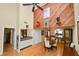 Bright and airy living space with a dining area, high ceilings, and wood accents, creating a welcoming atmosphere at 2025 Sylvester Rd # E2, Lakeland, FL 33803