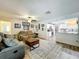 Inviting living room shows open layout, comfortable seating, and stylish decor at 203 N Sweetwater Blvd, Longwood, FL 32779