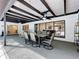 Covered patio area with a dining table, ceiling fans, and views of the surrounding landscape at 203 N Sweetwater Blvd, Longwood, FL 32779