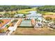 Community center with large pool, shuffleboard court, and meticulously kept grounds at 2101 Cypress Cross Dr, Lakeland, FL 33810