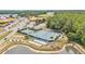 Community tennis courts and bocce ball with verdant landscaping and ample parking at 2101 Cypress Cross Dr, Lakeland, FL 33810