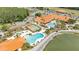 Resort-style amenities: pools, clubhouse, verdant golf course, and tropical landscaping at 2101 Cypress Cross Dr, Lakeland, FL 33810