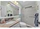Bright bathroom with a vanity, shower, and neutral accents at 2101 Cypress Cross Dr, Lakeland, FL 33810