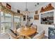 Cozy breakfast nook featuring a large window with views of the outside and unique wall art at 2101 Cypress Cross Dr, Lakeland, FL 33810