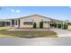 Inviting single-story home featuring a covered parking area and well-maintained landscaping at 211 Sweet Cir, Winter Haven, FL 33884