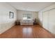 Open living room featuring laminate floors, comfortable seating, and natural lighting at 211 Sweet Cir, Winter Haven, FL 33884