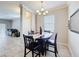 Dining room featuring a wood table, overhead light and a window for plenty of natural light at 2112 Betsy Ross Ln, St Cloud, FL 34769