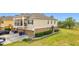 A charming two-story home with a two-car garage and a small balcony for added curb appeal at 2112 Betsy Ross Ln, St Cloud, FL 34769