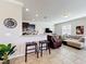 A combined living and kitchen area provides a great open floor plan for gathering and conversation at 2112 Betsy Ross Ln, St Cloud, FL 34769