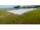 Community volleyball court with pristine sand and surrounding grassy area at 2112 Betsy Ross Ln, St Cloud, FL 34769