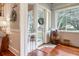 Inviting entryway with wooden accents and natural light creates a warm and welcoming atmosphere at 2115 W Pipkin Rd, Lakeland, FL 33811