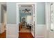 Inviting home office with custom bookcase, ceiling fan, and French doors leading to other rooms at 2115 W Pipkin Rd, Lakeland, FL 33811