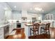 Bright, updated kitchen features a central island, stainless appliances, granite countertops, and ample cabinet space at 2115 W Pipkin Rd, Lakeland, FL 33811
