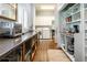 Functional pantry offers extensive counter space, appliances, and abundant storage solutions at 2115 W Pipkin Rd, Lakeland, FL 33811