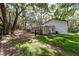 Exterior view of property showing additional structures and landscaping at 2115 W Pipkin Rd, Lakeland, FL 33811