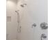 Walk-in shower features chrome fixtures and white subway tile, offering both style and functionality at 2115 W Pipkin Rd, Lakeland, FL 33811