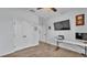 Bright bedroom with wood-look tile flooring and ample closet space at 2277 Bella Luna Cir, Lakeland, FL 33810