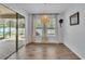 Bright dining area with slider doors and backyard views at 2277 Bella Luna Cir, Lakeland, FL 33810