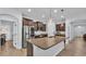 Kitchen featuring granite countertops, stainless steel appliances, and wooden cabinets at 2277 Bella Luna Cir, Lakeland, FL 33810