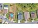 An overhead image capturing a collection of houses, each boasting its private swimming pool in backyard at 2468 Winnipeg Dr, Lakeland, FL 33805