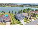 A view of well-manicured lawns surrounding lovely houses near a beautiful lake at 2468 Winnipeg Dr, Lakeland, FL 33805