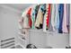 Walk-in closet with lots of space for shoes, shelves, and hanging shirts at 2468 Winnipeg Dr, Lakeland, FL 33805