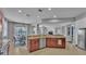 Open concept kitchen with stainless steel appliances, granite countertops and an eat in breakfast nook with water views at 2468 Winnipeg Dr, Lakeland, FL 33805