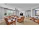 Inviting living room with tile floors, lake view, comfortable seating, and decorative accents at 2468 Winnipeg Dr, Lakeland, FL 33805