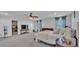 Spacious main bedroom features neutral decor, carpet, and a ceiling fan at 2468 Winnipeg Dr, Lakeland, FL 33805