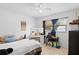 Bedroom highlighting a makeup vanity, a ceiling fan, and ample natural light at 2520 Avenue C Sw, Winter Haven, FL 33880