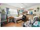 Bedroom featuring a ceiling fan, an entertainment center, and ample space at 2520 Avenue C Sw, Winter Haven, FL 33880