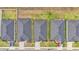 Bird's eye view capturing neat rows of single-Gathering homes, showcasing uniform rooftops and tidy yards at 2611 San Marco Way, Winter Haven, FL 33884