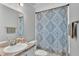 Clean bathroom with shower/tub combo and modern fixtures at 2611 San Marco Way, Winter Haven, FL 33884