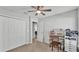 Bedroom with neutral walls, carpet, closet, and dressing table at 2611 San Marco Way, Winter Haven, FL 33884
