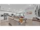 Spacious open-concept living area flows into a modern kitchen, perfect for entertaining and comfortable living at 2611 San Marco Way, Winter Haven, FL 33884
