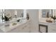 Bright bathroom features sleek vanity, modern lighting, and elegant fixtures for a spa-like feel at 2645 Delphi Hills Ct, Lakeland, FL 33812