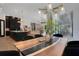 Open dining space with modern lighting and hardwood floors at 2645 Delphi Hills Ct, Lakeland, FL 33812