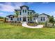 Beautiful two-story home with manicured lawn and garden at 2645 Delphi Hills Ct, Lakeland, FL 33812