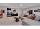 Entertainment room features a wet bar with stainless steel appliances, perfect for hosting at 2645 Delphi Hills Ct, Lakeland, FL 33812