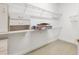 Walk-in closet with white shelving at 2820 Prestwick Dr, Lakeland, FL 33803