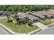 Spacious home with landscaped yard, a screened garage, and a lush green lawn at 3187 Bellflower Way, Lakeland, FL 33811