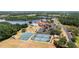 Community amenities include a pool, lake, clubhouse, tennis courts and more, all surrounded by beautiful greenery at 3187 Bellflower Way, Lakeland, FL 33811
