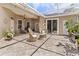 Back porch with ample seating, ceiling fans, clear roof and sliding glass door at 3187 Bellflower Way, Lakeland, FL 33811