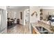 Bright kitchen with stainless steel appliances and an open view into the dining area at 3187 Bellflower Way, Lakeland, FL 33811