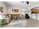 Comfortable living room featuring an open floor plan, neutral colors, and stylish furnishings at 3187 Bellflower Way, Lakeland, FL 33811