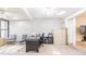 Bright office space with skylights, featuring a desk, filing cabinets, and comfortable seating at 319 Shadow Moss Ct # 319, Lakeland, FL 33813