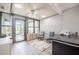Comfortable office space with natural light, ceiling fan, and convenient outdoor access at 319 Shadow Moss Ct # 319, Lakeland, FL 33813
